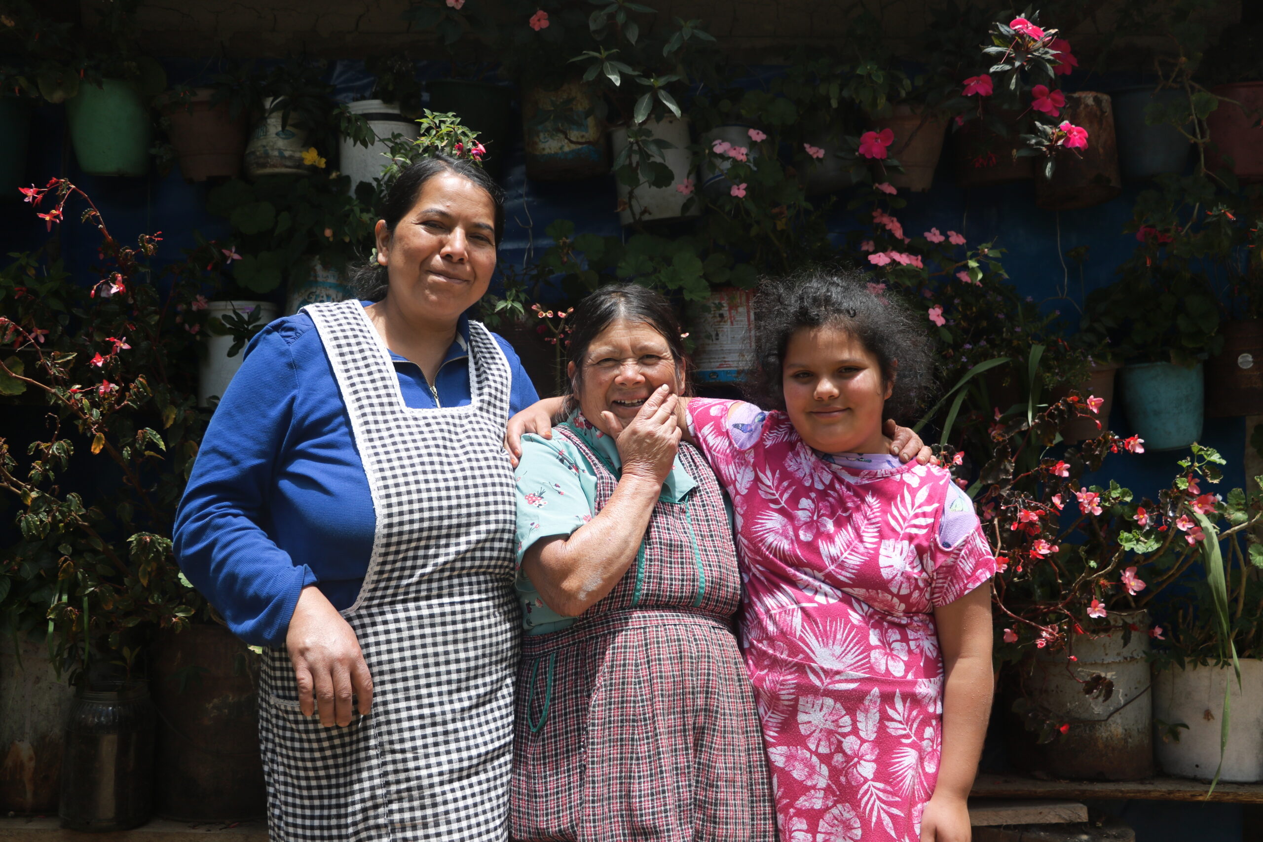 Three generations receiving medicine in Guatemala